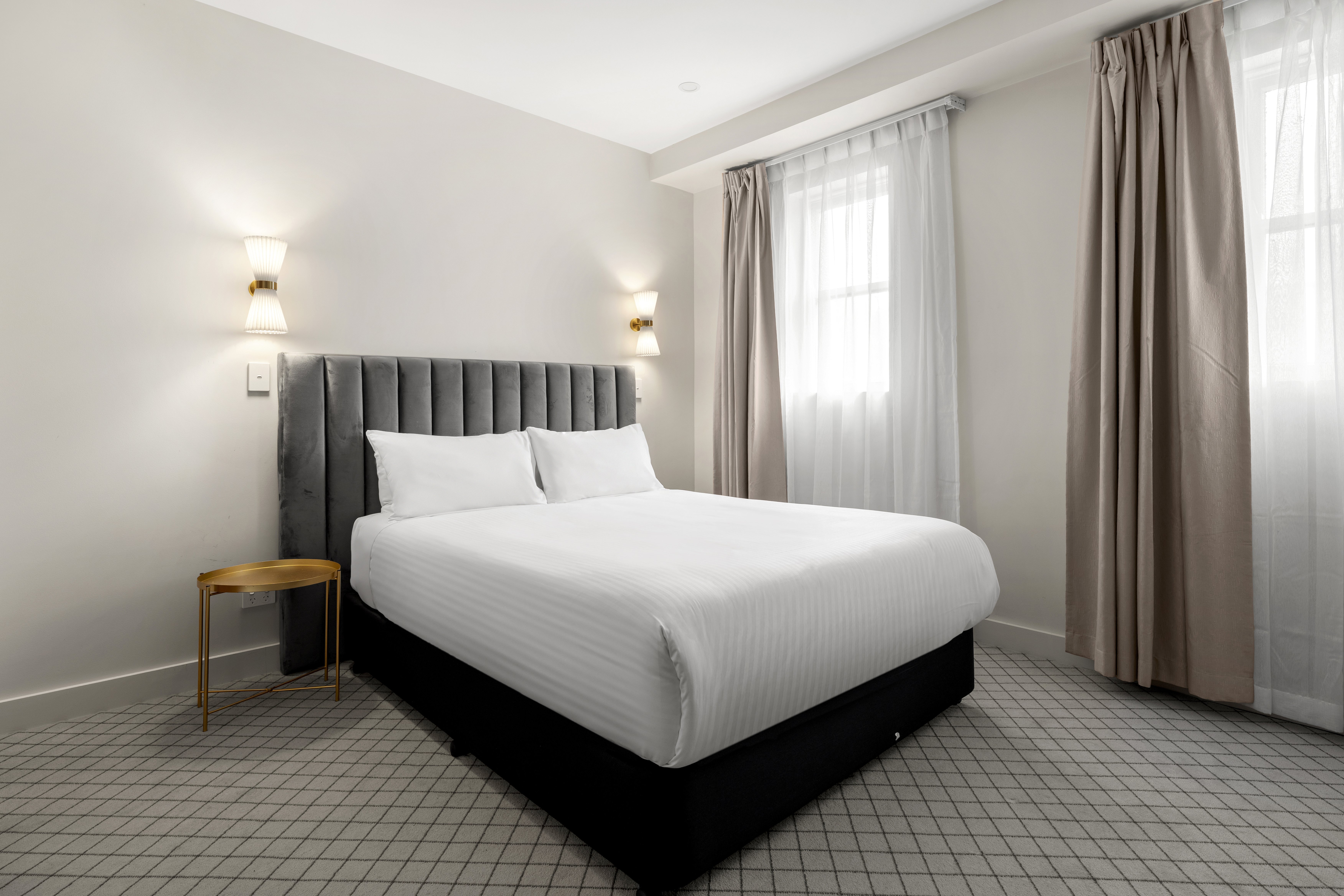The Metropole Guesthouse-guestroom-Queen Deluxe Room.jpg