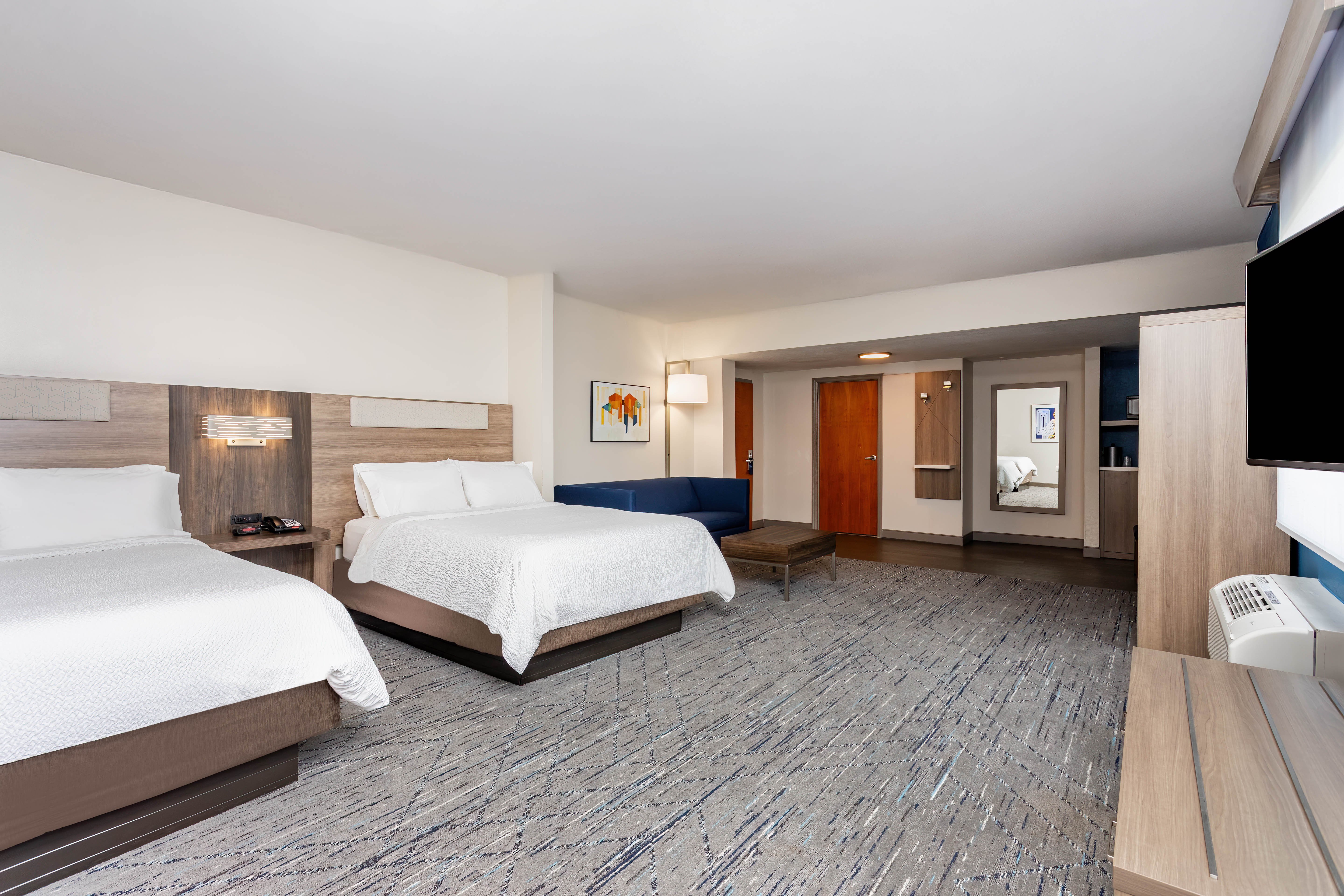 HOLIDAY INN EXP STES LANTANA BY IHG-guestroom-Unwind in your room while you watch your favorite TV show..jpg