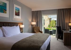 NESS WALK-guestroom-BedroomsKing Room Cedarwithprivatepatio.jpg