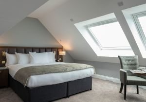 NESS WALK-guestroom-BedroomsWellingtonigSuitesqm.jpg