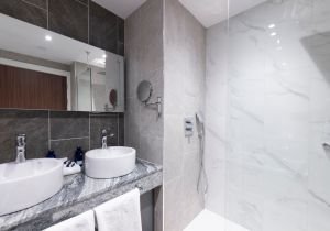 NESS WALK-guestroom-Bedrooms Separat RainShowerBathroom.jpg