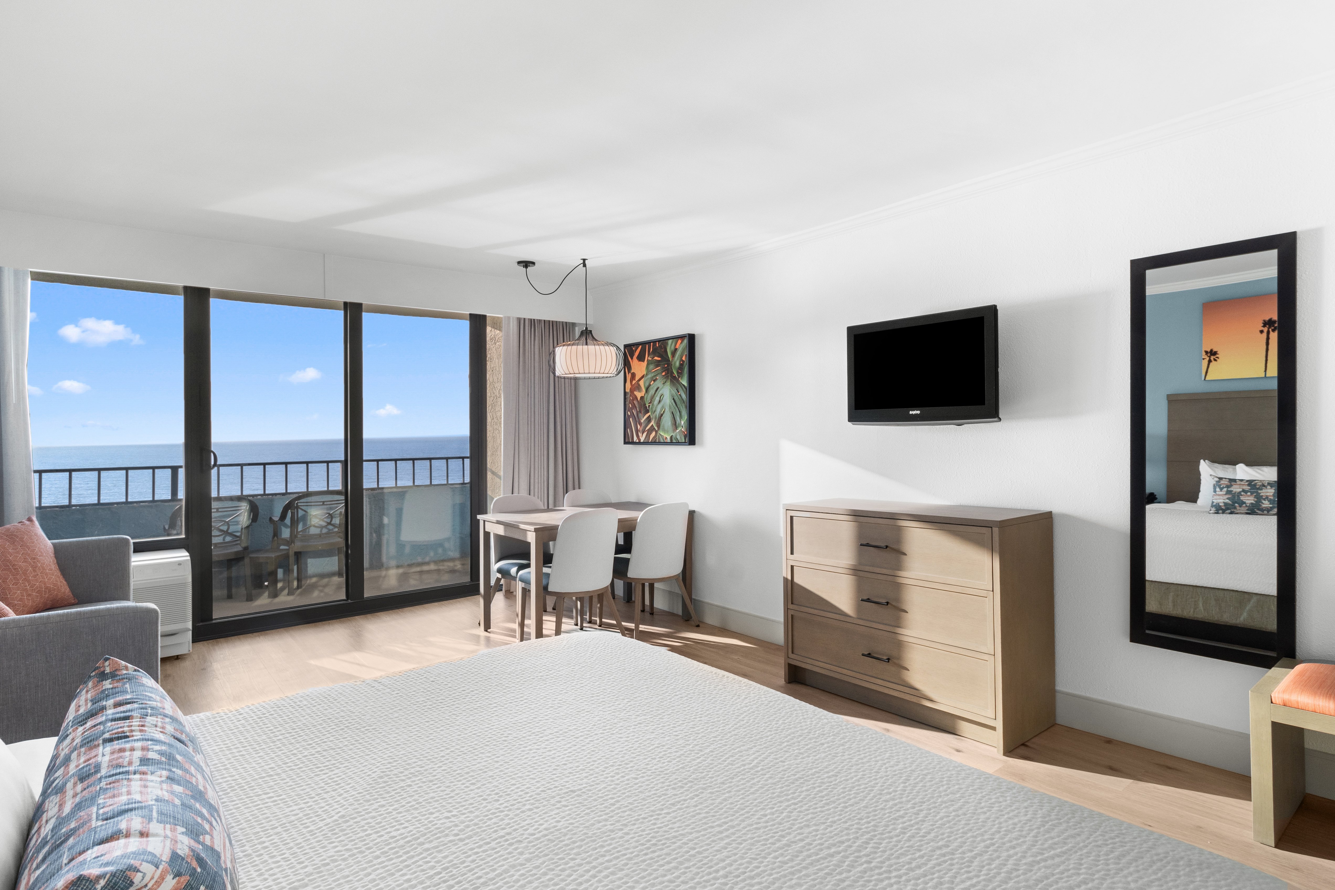 Ocean Reef Resort-guestroom-ocean reef oceanfront deluxe king room unit bedroom.jpg